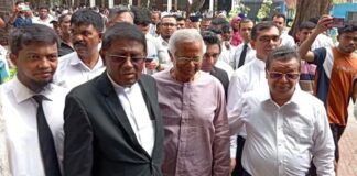 লোহার খাঁচায় দাঁড়াতে হলো, এটা অভিশপ্ত জীবনের একটা অংশ : ড. ইউনূস