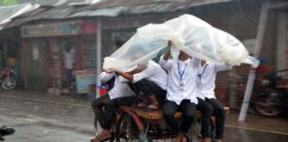 বৃষ্টি বিরম্বনায় পরীক্ষার্থীরা