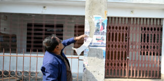 পত্রিকায় ছবি প্রকাশের পর প্রার্থীদের বিলবোর্ড সরানোর হিরিক